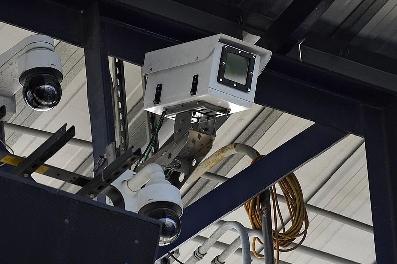 One of the cameras used for automatic balls and strike calls is shown during the first inning of a Low A Southeast league baseball game between the Dunedin Blue Jays and the Tampa Tarpons at George M. Steinbrenner Field Tuesday, May 4 in Tampa, Fla. The game is one of the first in the league to use automatic calls. (AP Photo/Chris O’Meara)