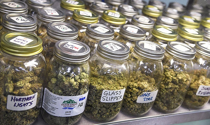 Medical marijuana is displayed in a glass case for customers at Green Springs Medical Dispensary in Hot Springs on March 26, 2020. - File photo by The Sentinel-Record