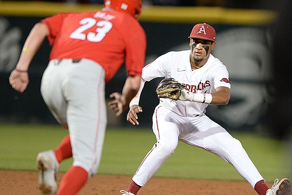 Arkansas shortstop Jalen Battles (4) forces out Georgia base runner Connor Tate during a game Friday, May 7, 2021, in Fayetteville.