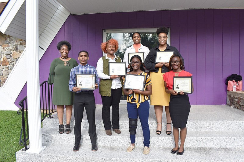 Left, second row) Constance Castle of the University of Arkansas Pine Bluff poses with Unified Christian Alliance Scholarship recipients. Honorees were (from left, first step) Trenton S. Harris, Morgan D. White and Brooke D. White; (second step) Amiya Helloms and Aliah Carlock; and (third row) Faith Jackson. (Special to The Commercial)