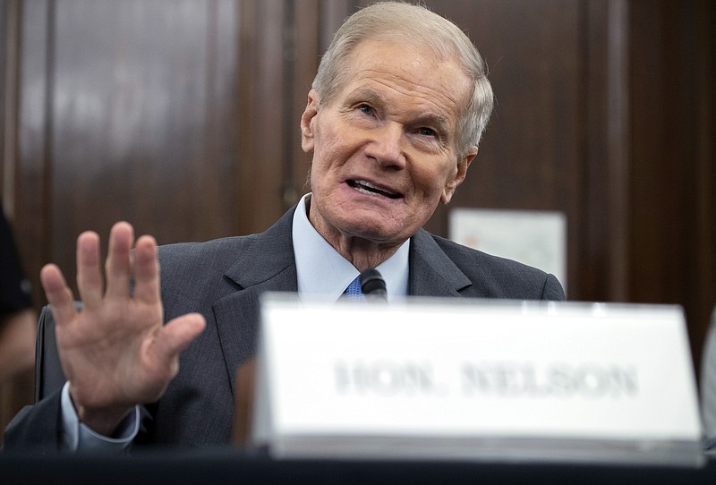 FILE - In this Wednesday, April 21, 2021 file photo, former U.S. Sen. Bill Nelson, nominee for administrator of NASA, speaks during a Senate Committee on Commerce, Science, and Transportation confirmation hearing, on Capitol Hill in Washington. In his first news interview since becoming NASA’s top official this week, Nelson told The Associated Press on Friday, May 7 that measuring the climate and diversifying the workforce are top issues. Nelson hedged on whether the U.S. can put astronauts on the moon by 2024. (Saul Loeb/Pool via AP)