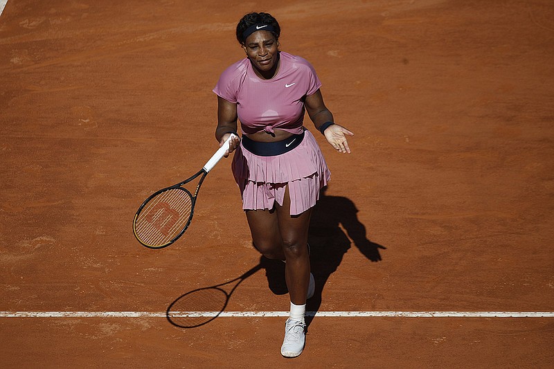 Serena Williams of the United States reacts during her match against Nadia Podoroska of Argentina, at the Italian Open tennis tournament, in Rome, Wednesday, May 12, 2021. (AP Photo/Alessandra Tarantino)