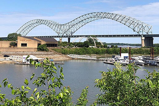 The Interstate 40 bridge that connects Arkansas and Tennessee, shown Wednesday, remains closed as officials await national experts in bridge repair. Meanwhile, barge traffic on that section of the Mississippi River has also been shut down for safety reasons. (AP/Adrian Sainz)