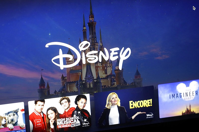 A Disney logo forms part of a menu for the Disney Plus movie and entertainment streaming service on a computer screen in Walpole, Mass., in this Nov. 13, 2019, file photo. (AP/Steven Senne)