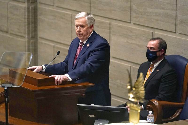 Missouri Gov. Mike Parson delivers the State of the State address at Jefferson City, Mo., in this Jan. 27, 2021 file photo, as Lt. Gov. Mike Kehoe listens at right. (AP/Jeff Roberson)