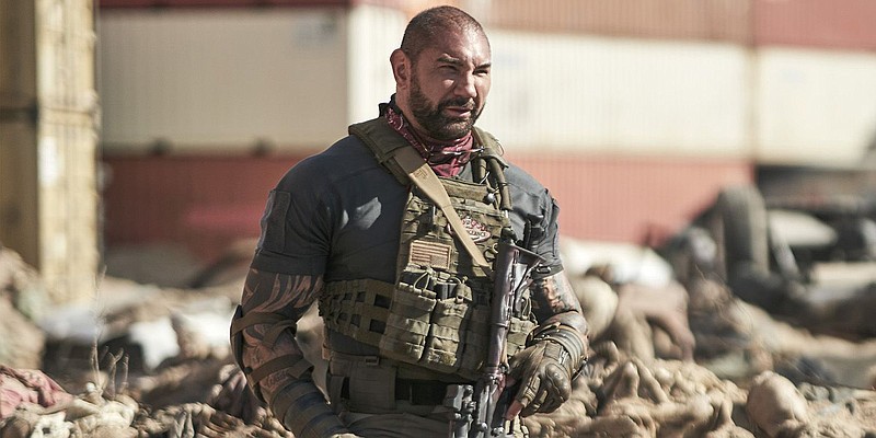 Scott Ward (Dave Bautista) is the leader of the group of mercenaries who’ve gone to Nevada in the middle of a zombie apocalypse to steal millions of dollars from a Las Vegas casino in Zack Snyder’s “Army of the Dead.”