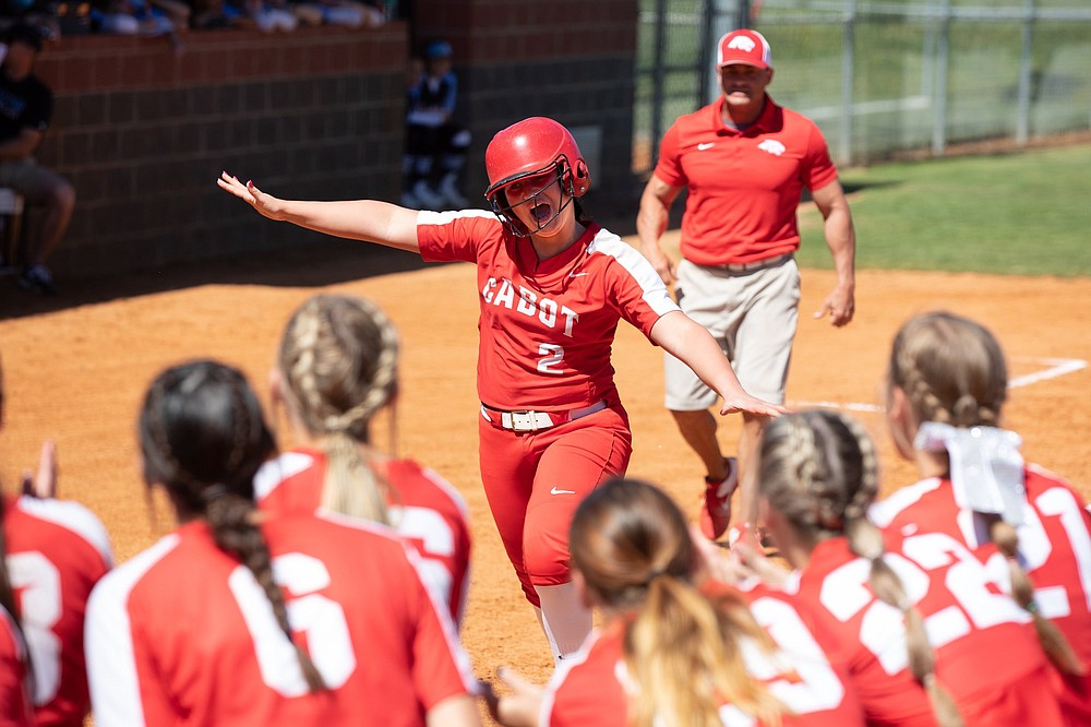 Savannah Snow of Cabot celebrates after hitting a home run to lead the defending state champions to an 11-9 victory over Fort Smith Southside in a Class 6A state softball tournament quarterfinal Friday in Cabot. Snow went 2 for 4 with a home run, a double, 2 runs and 3 RBI for the Lady Panthers, who move on to play Conway in a semifinal today. More photos at arkansasonline.com/515girls6a1/.
(Arkansas Democrat-Gazette/Justin Cunningham)