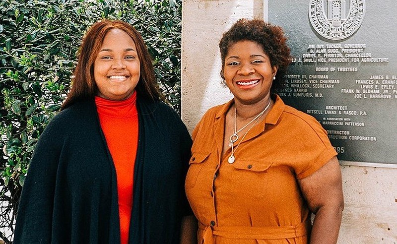 Mia Martin (left) is shown with her adviser, Patrice Sims, outside the Dale Bumpers College of Agricultural, Food and Life Sciences at the University of Arkansas, Fayetteville in this undated photo. Martin is the first dual-degree graduate of UA and the University of Arkansas at Pine Bluff under the “3-plus-1” program that allows a student to take three years of coursework at UAPB and a final year at Fayetteville. Sims is a project program specialist at the college. (Special to The Commercial)