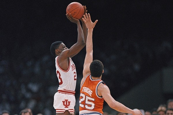 Syracuse's Howard Triche (25) tries to stop Indiana's Keith Smart from making a shot in the final moments of the NCAA Championship game in New Orleans, La., in 1987. Indiana won the last of its three championships under coach Bobby Knight in 1987, and it did so in dramatic fashion – with Keith Smart connecting on a baseline jumper in the closing seconds to give the Hoosiers a 74-73 win over Syracuse. (AP Photo/Susan Ragan, File) Syracuse's Howard Triche (25) tries to stop Indiana's Keith Smart from making a shot in the final moments of the NCAA Championship game in New Orleans, La., in 1987. Indiana won the last of its three championships under coach Bobby Knight in 1987, and it did so in dramatic fashion – with Keith Smart connecting on a baseline jumper in the closing seconds to give the Hoosiers a 74-73 win over Syracuse. (AP Photo/Susan Ragan, File)