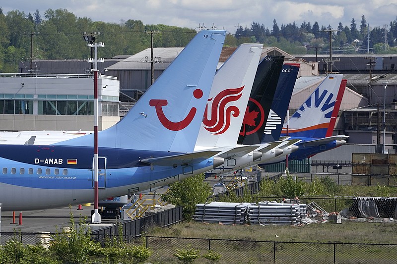 Boeing 737 Max jetliners sit last month in a storage lot near Boeing Field in Seattle.
(AP/Ted S. Warren)