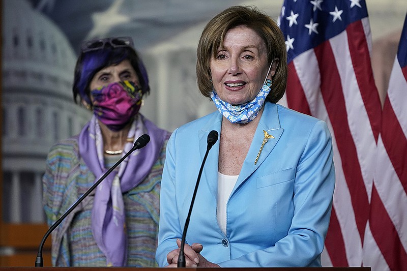 House Speaker Nancy Pelosi, with Rep. Rosa DeLauro, D-Conn., talks to reporters Wednesday before the House approved legislation on forming the commission to investigate the Jan. 6 Capitol breach.
(AP/Susan Walsh)