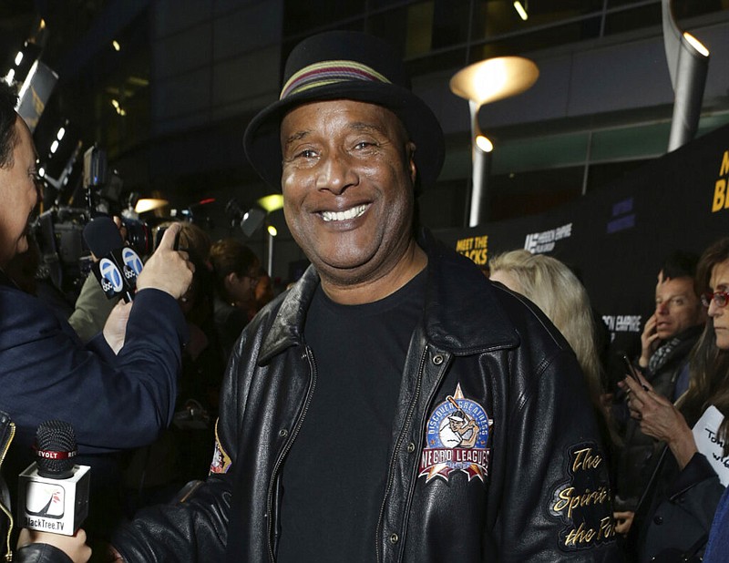 Paul Mooney poses at the premiere of "Meet the Blacks" in Los Angeles in this March 29, 2016, file photo. Mooney, whose sage, incisive musings on racism and American life made him a revered figure in stand-up, died of a heart attack at his Oakland, Calif., home on Wednesday, May 19, 2021. He was 79. (Eric Charbonneau/Meet The Blacks via AP)