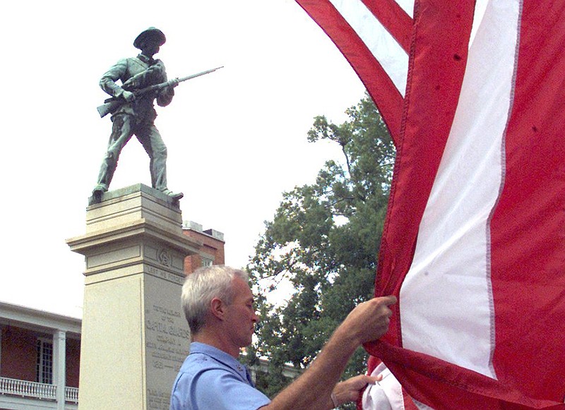 The statue “Memorial to Company A, Capital Guards,” which was removed from the grounds of the MacArthur Museum of Arkansas Military History last year, is shown in this July 2002 photo.
(Arkansas Democrat-Gazette/Staton Breidenthal)