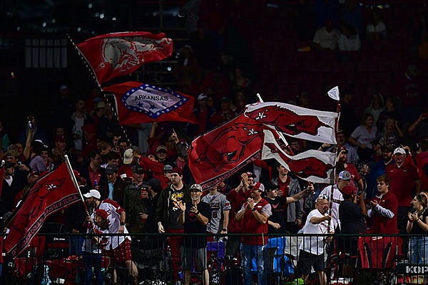 Arkansas fans celebrate during a game against Florida on Thursday, May 20, 2021, in Fayetteville.