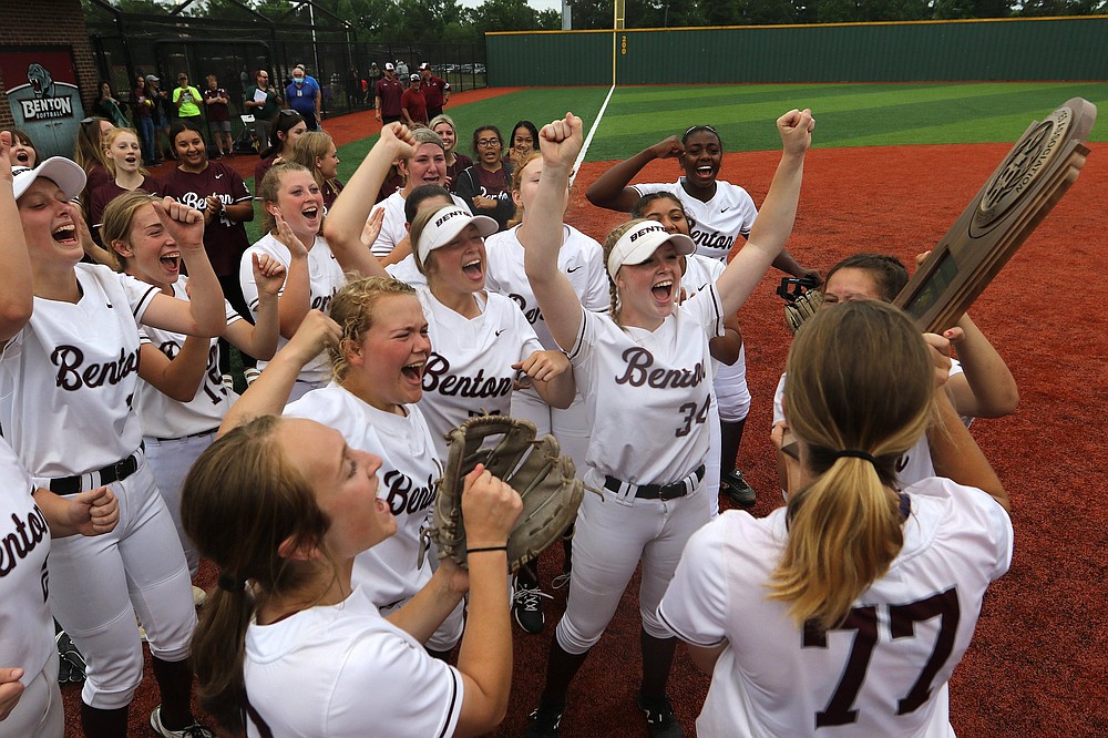 Benton players celebrate after the Lady Panthers’ 8-1 victory over Greenwood in the Class 5A state championship game Thursday. More photos at www.arkansasonline.com/521softball5a/
(Arkansas Democrat-Gazette/Thomas Metthe)