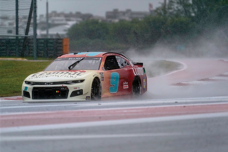 NASCAR Cup Series driver Chase Elliott drives out of Turn 18 in the rain during practice Saturday at the Circuit of Americas in Austin, Texas. Elliott, the defending Cup Series champion, will look for his first victory of the season during today’s Texas Grand Prix.
(AP/Chuck Burton)