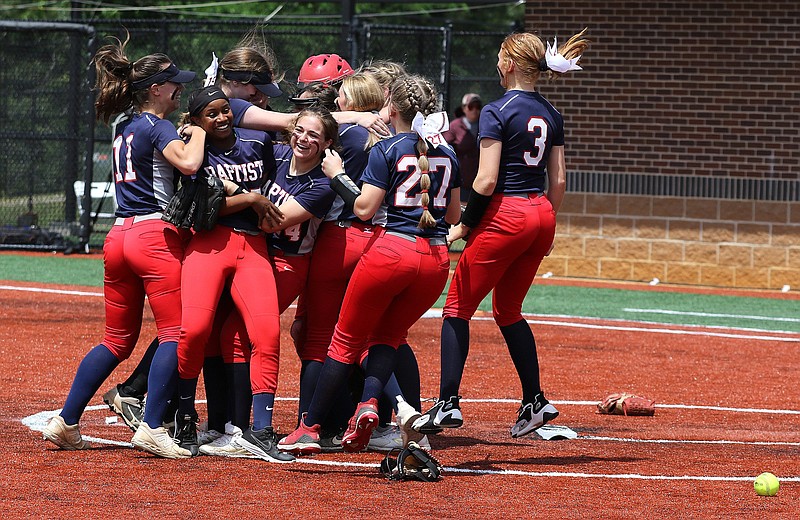 Baptist Prep players celebrate after the Lady Eagles’ 9-1 victory over Hoxie in the Class 3A softball state championship game Saturday in Benton. Baptist Prep used two big innings to secure the victory. More photos at www.arkansasonline.com/523softball/
(Arkansas Democrat-Gazette/Thomas Metthe)