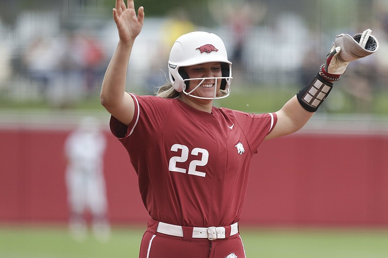 Arkansas outfielder Linnie Malkin (22) runs home for a score, Saturday, May 22, 2021 during the NCAA Fayetteville Softball Regional at Bogle Park in Fayetteville. Check out nwaonline.com/210523Daily/ for today's photo gallery. .(NWA Democrat-Gazette/Charlie Kaijo)