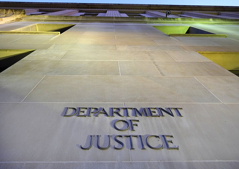 The headquarters of the U.S. Justice Department building in Washington is photographed early in the morning in this May 14, 2013, file photo. (AP/J. David Ake)