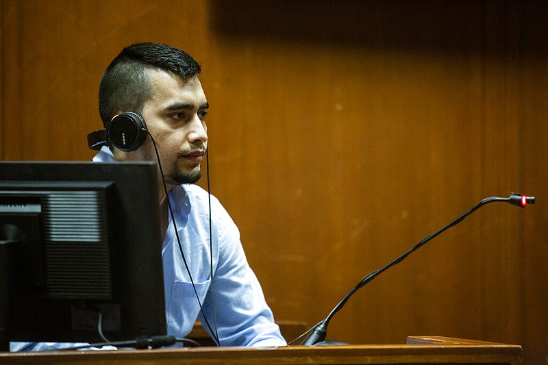 Cristhian Bahena Rivera testifies from the witness stand in the Scott County (Iowa) Courthouse at Davenport in this May 26, 2021, file photo. Bahena Rivera was charged with first-degree murder in the 2018 death of Mollie Tibbetts. (Kelsey Kremer/The Des Moines Register via AP)