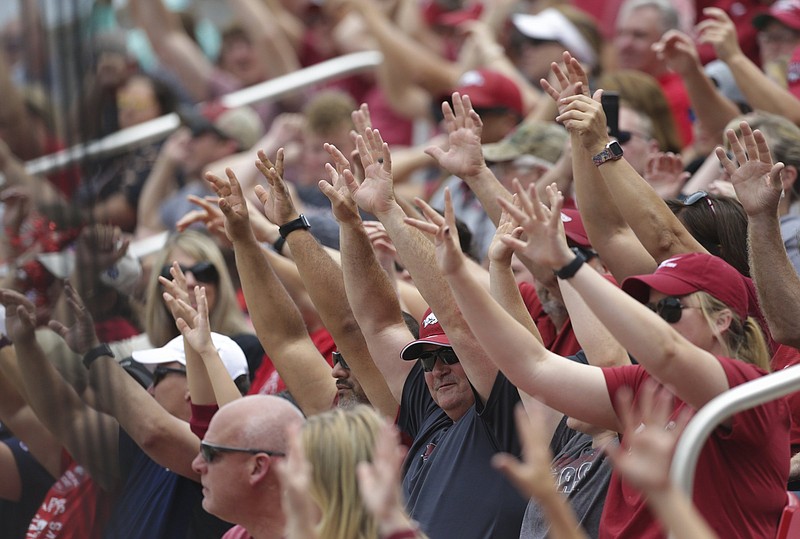 Attendance for Arkansas’ softball team’s regional clincher Sunday at Bogle Park in Fayetteville was 2,604, the fourth-largest crowd ever at the stadium. An even bigger sellout crowd is expected today for the super regional opener against Arizona.
(NWA Democrat-Gazette/Charlie Kaijo)