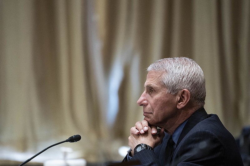 Dr. Anthony Fauci, director of the National Institute of Allergy and Infectious Diseases and shown at a Senate hearing Wednesday, has joined calls for further investigation into the origins of the coronavirus.
(AP/Sarah Silbiger)