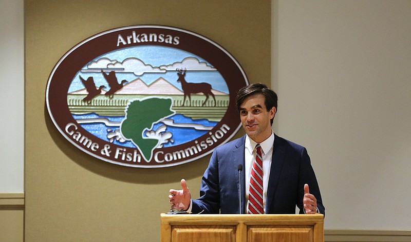Austin Booth speaks at the Arkansas Game and Fish Commission headquarters in Little Rock on Thursday, May 27, 2021, after he was named the new director of the commission during its board meeting. (Arkansas Democrat-Gazette/Thomas Metthe)