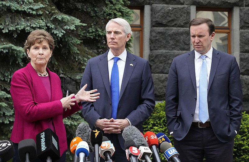 U.S. Sens. Jeanne Shaheen, Rob Portman (center) and Chris Murphy emphasize strong U.S. support for Ukraine during a briefing Wednesday in Kyiv after their meeting with Ukrainian President Volodymyr Zelenskyy.
(AP/Efrem Lukatsky)