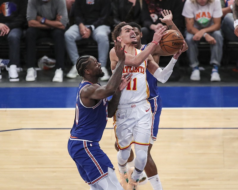 Atlanta Hawks guard Trae Young (11) drives past Julius Randle of the New York Knicks during the Hawks’ victory in their NBA Eastern Conference playoff series on Wednesday night The Hawks won the series 4-1.
(AP/Wendell Cruz)