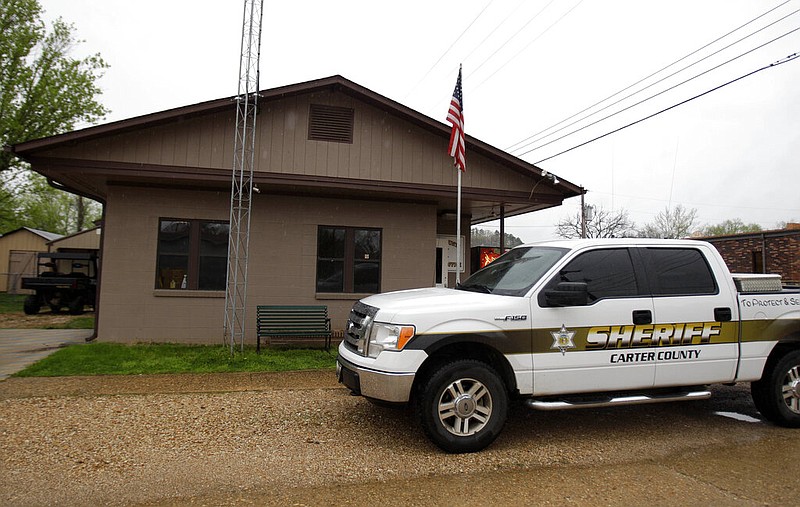 The Carter County (Mo.) sheriff's office and a sheriff's office vehicle for the Missouri county are seen in Van Buren, Mo., in this April 11, 2011, file photo. (AP/Jeff Roberson)