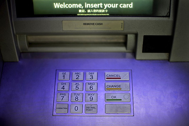 The keypad of an ATM, or automated teller machine, is shown in this July 16, 2013, file photo. (AP/David Goldman)