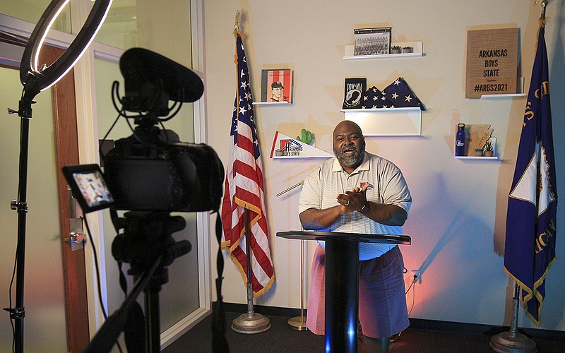 Lloyd Jackson, Boys State executive director, delivers election results to participants Thursday via live stream from the University of Central Arkansas campus in Conway. More photos at arkansasonline.com/64boys/.
(Arkansas Democrat-Gazette/Staton Breidenthal)