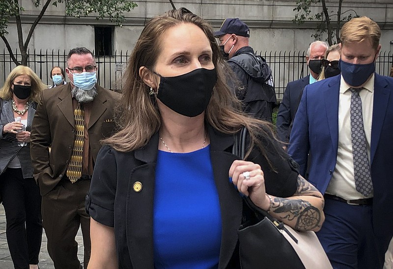 Natalie Mayflower Sours Edwards leaves court Thursday in New York after receiving a six-month prison sentence for leaking confidential financial reports to a journalist.
(AP/Larry Neumeister)