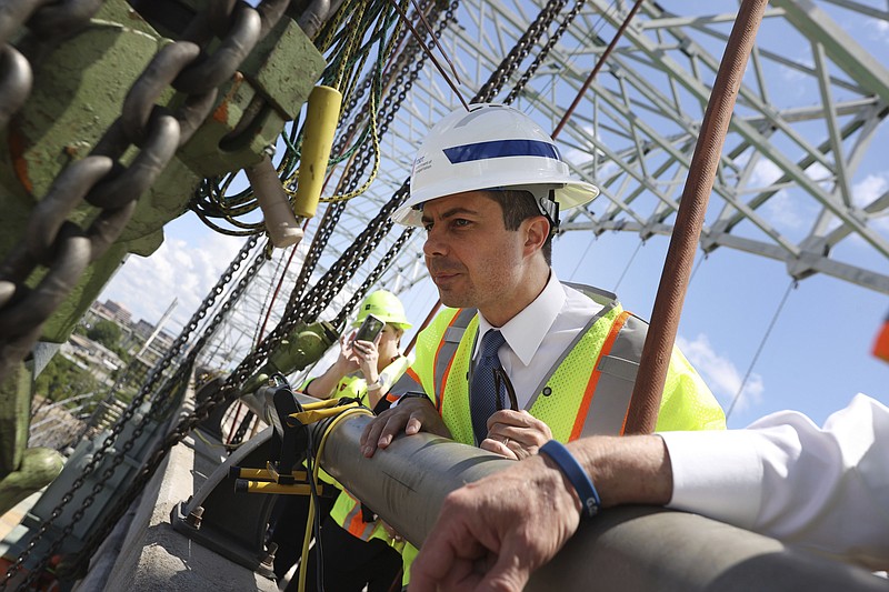Secretary of Transportation Pete Buttigieg tours the closed Hernando De Soto bridge which carries Interstate 40 across the Mississippi River between West Memphis, Arkansas, and Memphis, Tennessee on Thursday, June 3, 2021. The bridge has been shut down, halting traffic on the thoroughfare since May 11, 2021 after a fracture was discovered. (Joe Rondone/The Commercial Appeal via AP)