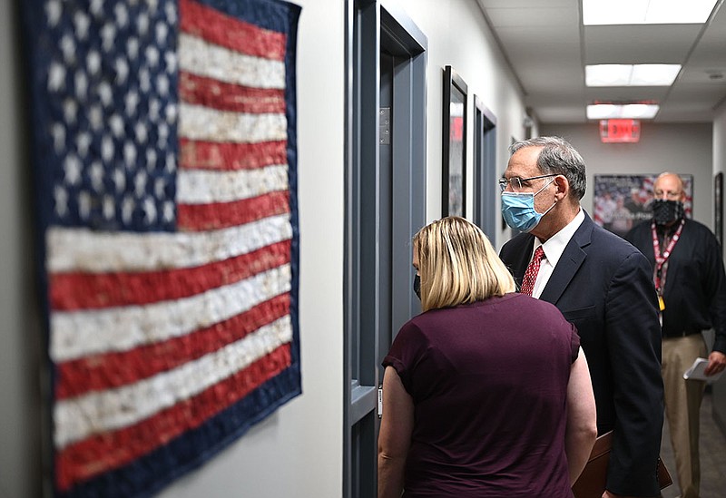 U.S. Sen. John Boozman, R-Ark., walks through the halls of the Little Rock Vet Center during a tour Friday. The visit was the senator’s first to the new center, which offers counseling services.
(Arkansas Democrat-Gazette/Stephen Swofford)