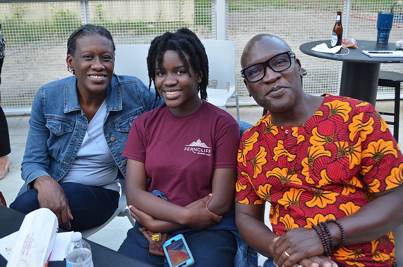 Kwadjo (from left) and Ayoka Boatey along with Karana Neal came to Pine Bluff from Little Rock to enjoy music and a movie during Friday’s “Live @ Five.” 
(Special to The Commercial/Richard Ledbetter)