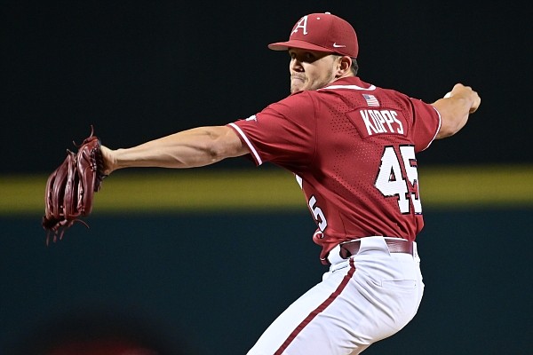 Arkansas reliever Kevin Kopps throws a pitch during a game against Nebraska in the NCAA Fayetteville Regional at Baum-Walker Stadium on June 5, 2021.