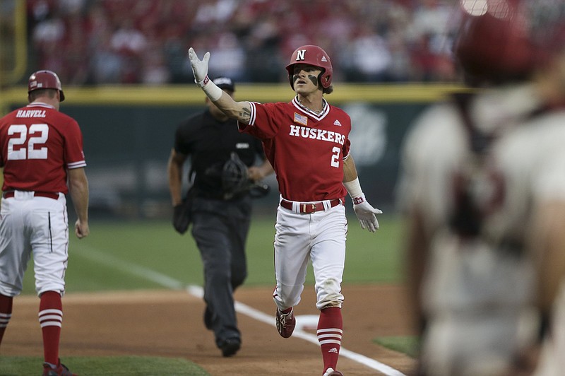 Nebraska's Jaxon Hallmark (2) scores against Arkansas on Sunday, June 6, 2021 during the first inning in the third game of the NCAA Fayetteville Regional at Baum-Walker Stadium in Fayetteville. (NWA Democrat-Gazette/Charlie Kaijo)