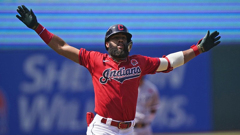 Cleveland Indians’ Amed Rosario celebrates after hitting a solo home run in the first inning of the first baseball game of a doubleheader against the Chicago White Sox, Monday, May 31, 2021, in Cleveland. (AP Photo/Tony Dejak)