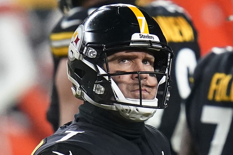 Pittsburgh Steelers quarterback Ben Roethlisberger (7) looking a the scoreboard as he walks off the field during the first half of an NFL wild-card playoff football game in Pittsburgh. Roethlisberger said it was his idea to take a voluntary pay cut and help ensure his return for an 18th season. (Associated Press)