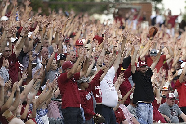 Arkansas fans cheer during an NCAA regional game against Nebraska on Monday, June 7, 2021, in Fayetteville.