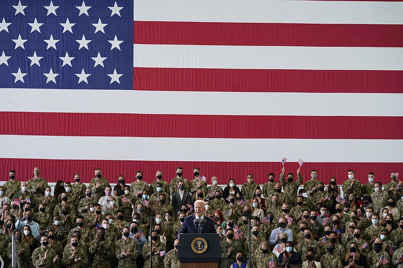 President Joe Biden speaks to American service members at RAF Mildenhall in Suffolk, England, Wednesday, June 9, 2021. (AP Photo/Patrick Semansky)