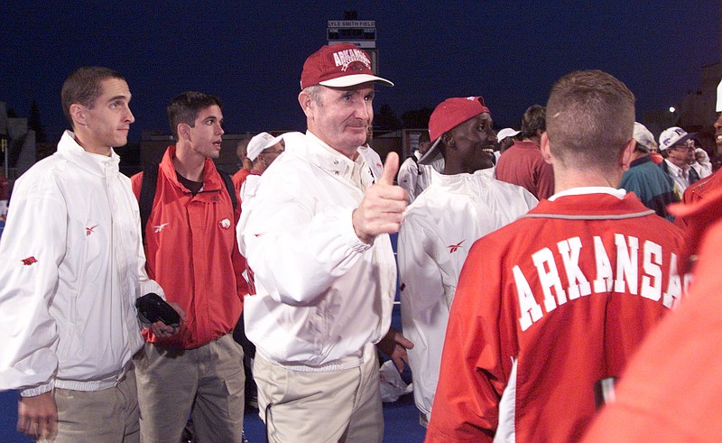 Arkansas Democrat-Gazette/CINDY BLANCHARD..Arkansas' John McDonnell wins his eighth straighty NCAA men's outdoor championship at Bronco Stadium in Boise, Idaho Saturday night. .6/5/99