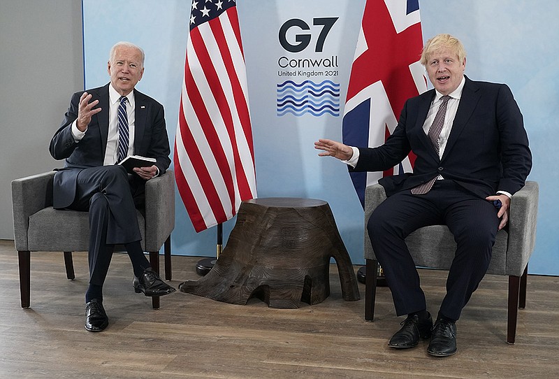 President Joe Biden and British Prime Minister Boris Johnson visit Thursday during a bilateral meeting ahead of the G-7 summit in Carbis Bay, England. “We affirmed the special relationship,” Biden said. More photos at arkansasonline.com/611g7/.
(AP/Patrick Semansky)