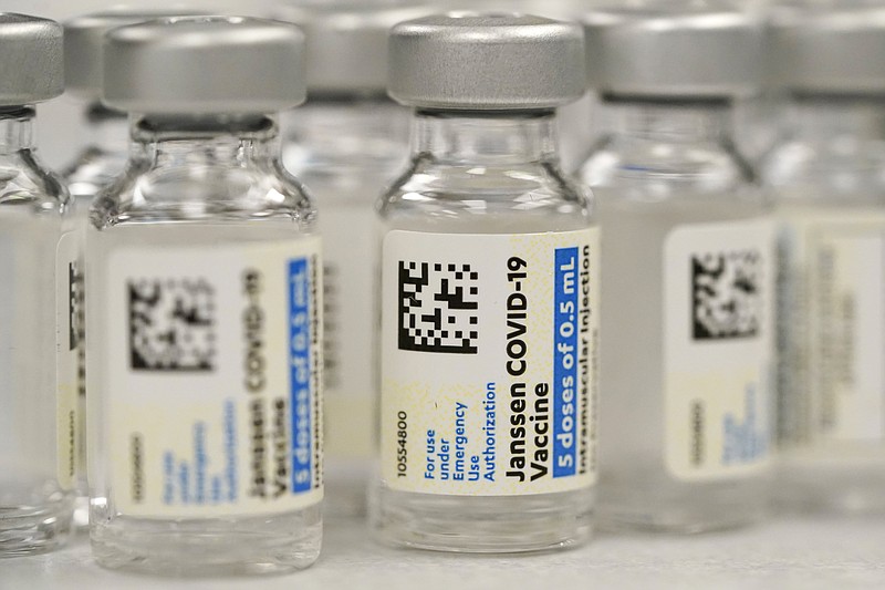 This Saturday, March 6, 2021 file photo shows vials of Johnson & Johnson COVID-19 vaccine at a pharmacy in Denver. On Thursday, June 10, 2021, Johnson & Johnson said that the U.S. Food and Drug Administration extended the expiration date on millions of doses of its COVID-19 vaccine by an extra six weeks. (AP Photo/David Zalubowski, File)