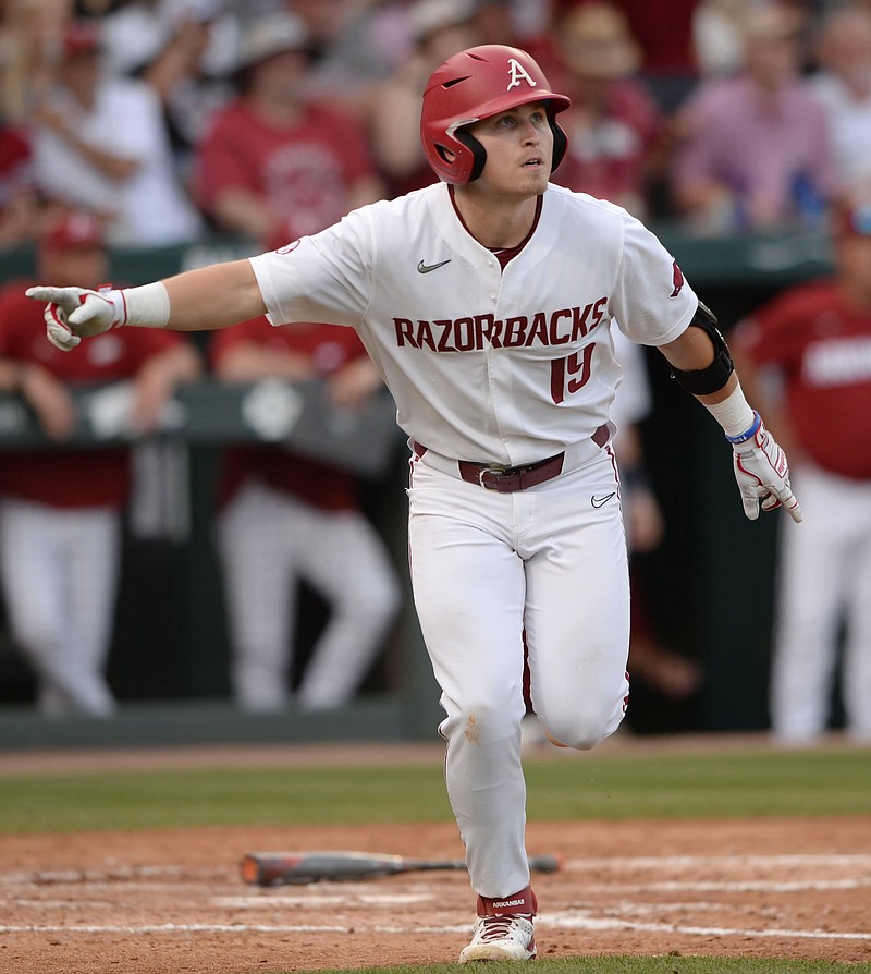 Designated hitter Charlie Welch heads to first base after hitting a two-run home run for Arkansas during the fifth inning of Friday’s victory over North Carolina State. With four home runs Friday, the Razorbacks now have 106 for the season, the most in the nation. More photos available at arkansasonline.com/612ncsua.
(NWA Democrat-Gazette/Andy Shupe)
