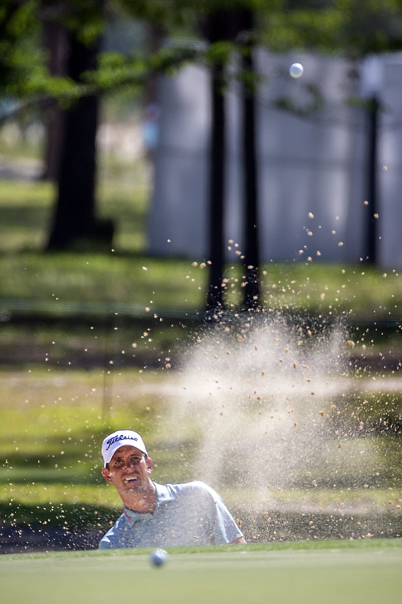 Chesson Hadley hits out of a bunker on the 12th hole Friday during the second round of the PGA Tour’s Palmetto Championship in Ridgeland, S.C. Hadley shot a 5-under 66 in the round and leads the tournament by two strokes over Dustin Johnson.
(AP/Stephen B. Morton)