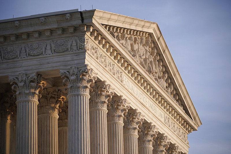 In this Nov. 5, 2020, file photo the Supreme Court is seen in Washington. With abortion and guns already on the agenda, the conservative-dominated Supreme Court is considering adding a third blockbuster issue _ whether to ban consideration of race in college admissions. (AP/J. Scott Applewhite, File)