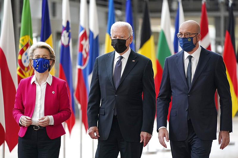 President Joe Biden, center, walks with European Council President Charles Michel, right, and European Commission President Ursula von der Leyen, during the United States-European Union Summit at the European Council in Brussels, Tuesday, June 15, 2021. (AP/Patrick Semansky)