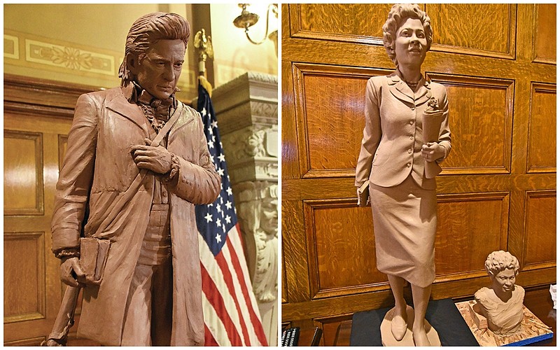 FILE — A clay sculpture of musician Johnny Cash (left) by Kevin Kresse of Little Rock and a clay sculpture of Daisy Gatson Bates (right) by Benjamin Victor of Boise, Idaho sit in the governor's conference room during the Capitol Arts and Grounds Commission meeting with the National Statuary Hall Steering Committee. (Arkansas Democrat-Gazette/Staci Vandagriff)